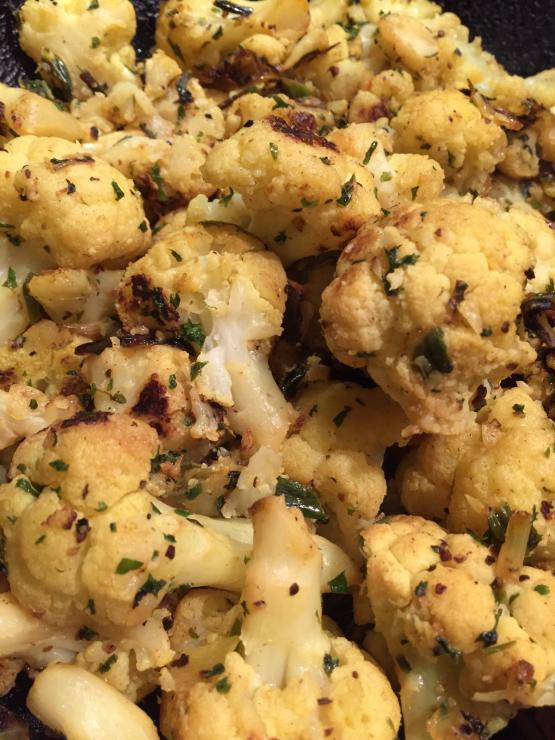 Quick and Easy Recipe for  Delicious Roasted Caulflower flavoured with Garlic and Lemon as Side dish. 